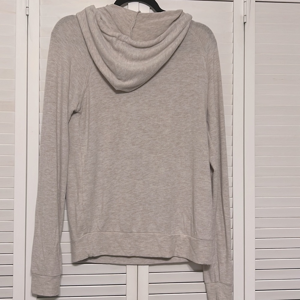 Tan hoodie by garage - Picture 4 of 4